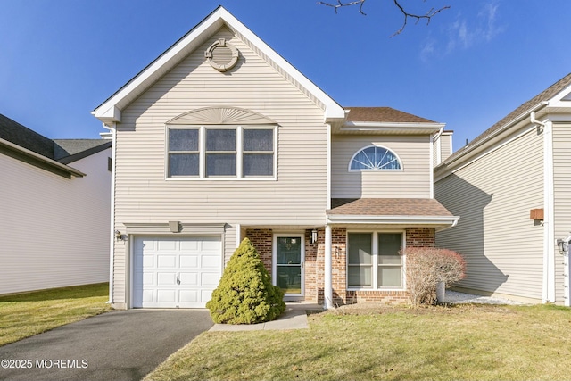 front facade featuring a garage and a front lawn