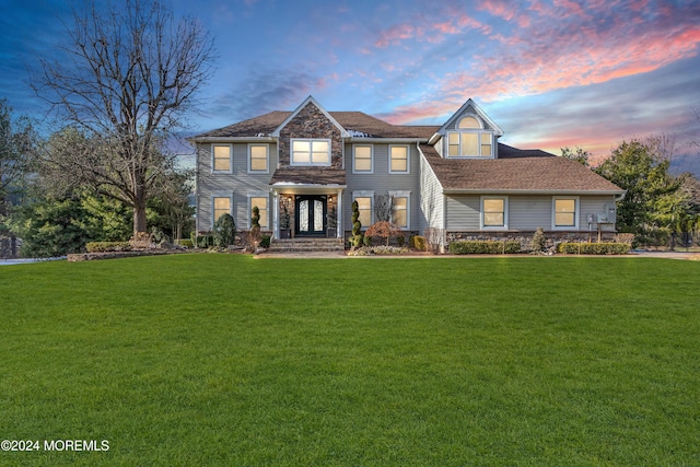 view of front of house with a lawn