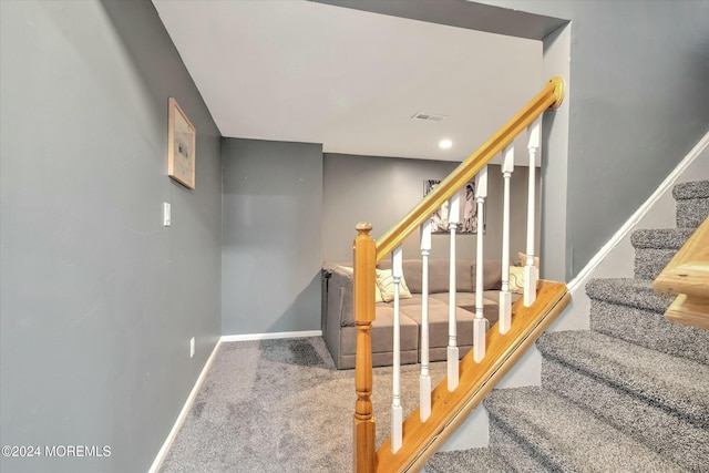 stairway with carpet flooring