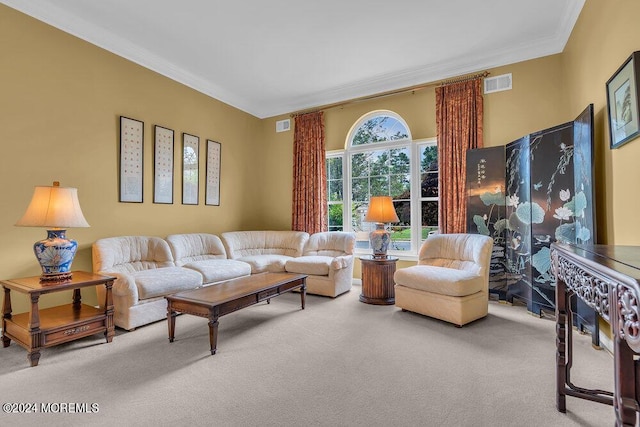 carpeted living room with ornamental molding