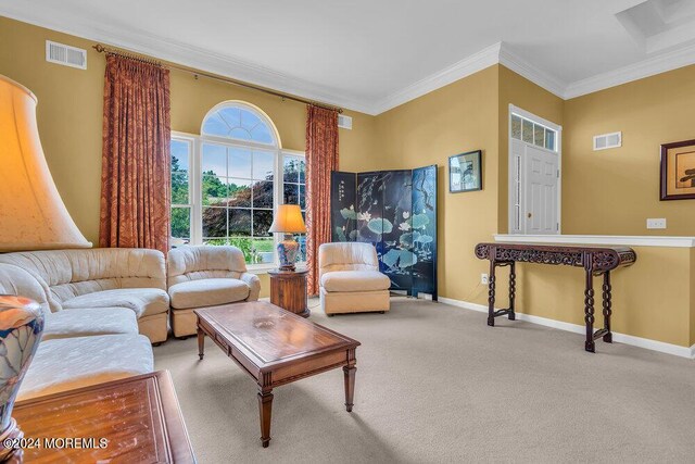 carpeted living room with ornamental molding