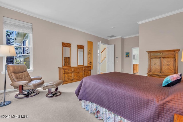 bedroom with carpet flooring and crown molding