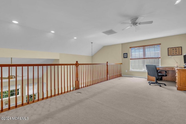 carpeted office with ceiling fan and lofted ceiling