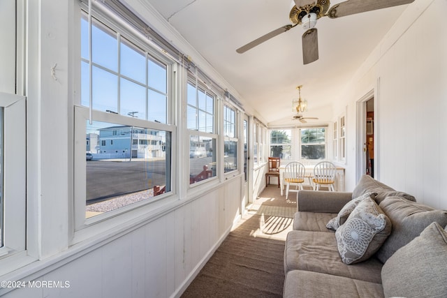 sunroom / solarium featuring ceiling fan