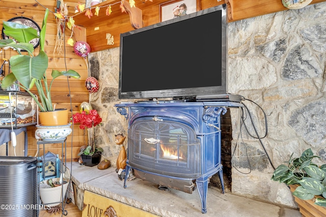 790 Farmingdale Rd, Jackson, NJ 08527 - detailed view of a wood stove, concrete floors, and wood walls