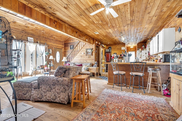 790 Farmingdale Rd, Jackson, NJ 08527 - living area with ceiling fan, wood ceiling, light wood-style floors, and wooden walls