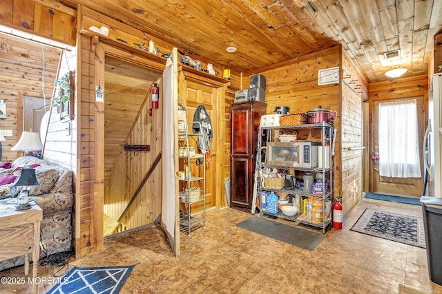 790 Farmingdale Rd, Jackson, NJ 08527 - entrance foyer with wood walls, wood ceiling, and tile patterned floors