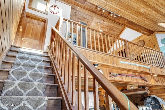 790 Farmingdale Rd, Jackson, NJ 08527 - stairs with wooden walls, wooden ceiling, track lighting, and a towering ceiling