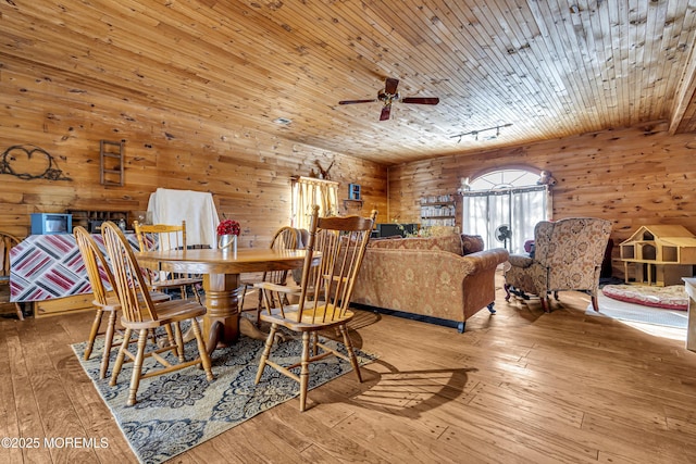 790 Farmingdale Rd, Jackson, NJ 08527 - dining room featuring hardwood / wood-style floors, wooden walls, ceiling fan, and wooden ceiling