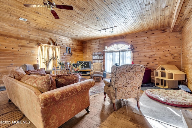 790 Farmingdale Rd, Jackson, NJ 08527 - living room with wooden walls, ceiling fan, rail lighting, hardwood / wood-style floors, and wooden ceiling