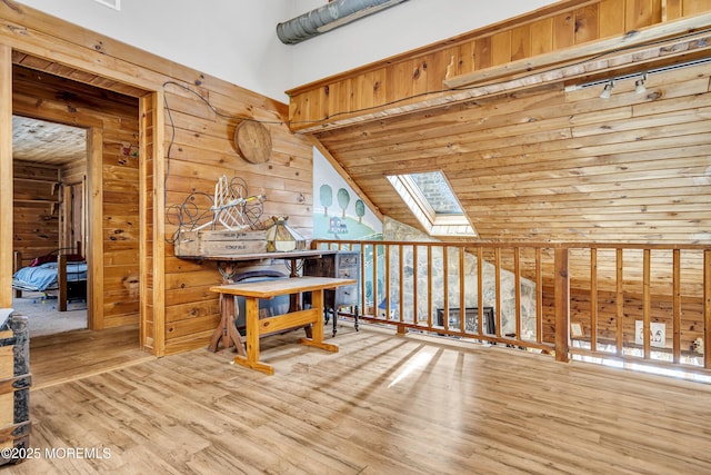 790 Farmingdale Rd, Jackson, NJ 08527 - unfurnished room featuring a skylight, wooden walls, wood finished floors, wood ceiling, and rail lighting