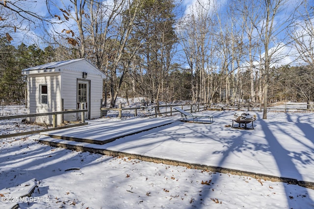 790 Farmingdale Rd, Jackson, NJ 08527 - snowy yard with a fire pit and an outdoor structure