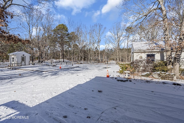 790 Farmingdale Rd, Jackson, NJ 08527 - yard covered in snow with an outdoor structure