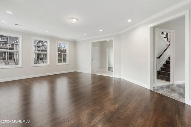 unfurnished room with dark hardwood / wood-style floors and ornamental molding