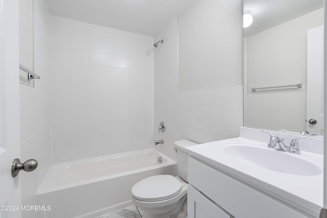 full bathroom with vanity,  shower combination, toilet, and tile walls