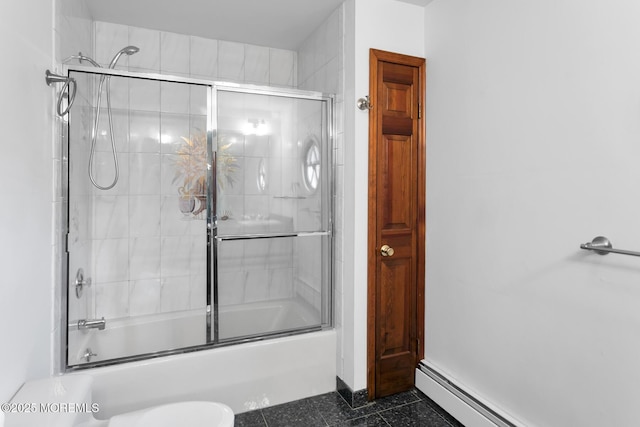 bathroom with shower / bath combination with glass door and a baseboard radiator