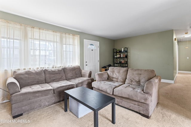 living room featuring light colored carpet