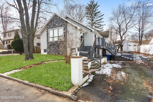 view of front of home with a front yard