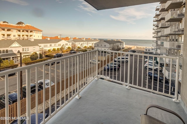 balcony at dusk with a water view