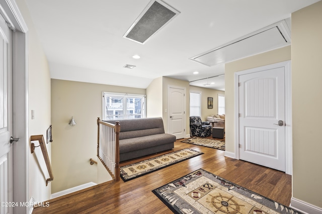 living room featuring dark hardwood / wood-style flooring