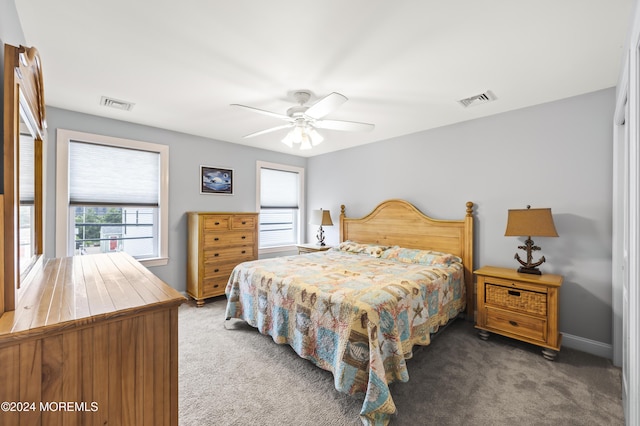 carpeted bedroom featuring ceiling fan