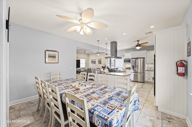 dining area featuring ceiling fan