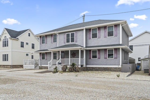 view of property with a porch