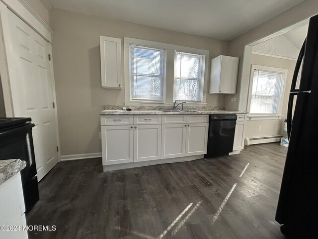 kitchen with white cabinetry, sink, baseboard heating, dark hardwood / wood-style flooring, and black appliances