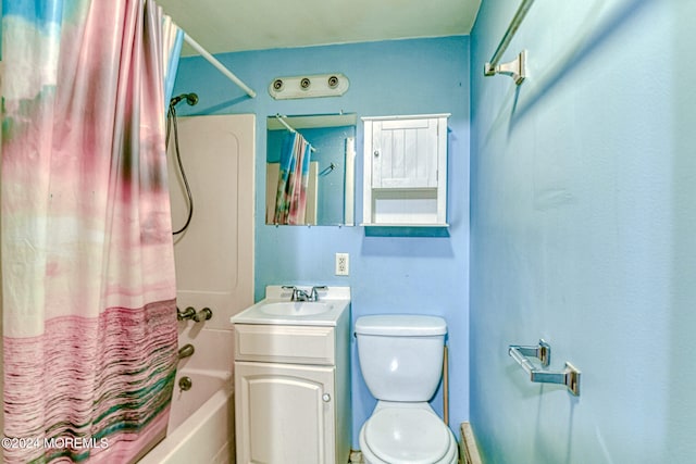 full bathroom featuring vanity, toilet, and shower / tub combo