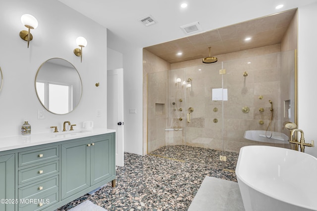 bathroom featuring vanity and plus walk in shower