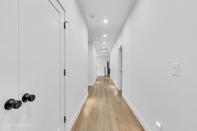 hallway featuring light hardwood / wood-style floors