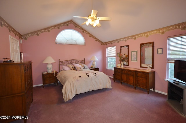 carpeted bedroom with ceiling fan and lofted ceiling