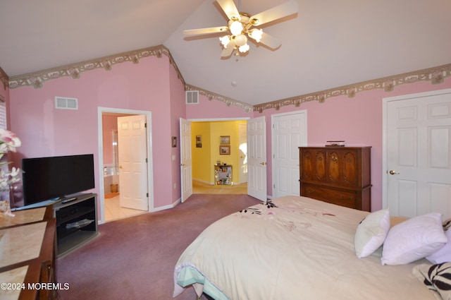 bedroom with light carpet, connected bathroom, ceiling fan, and lofted ceiling