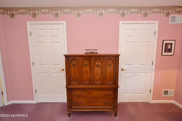 unfurnished bedroom with light carpet