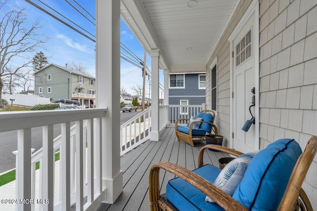 wooden deck featuring a porch