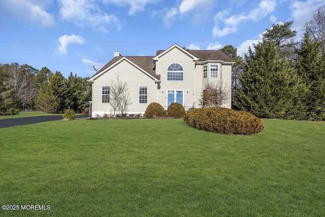 view of front property featuring a front yard