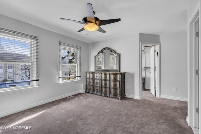 unfurnished bedroom with carpet flooring and ceiling fan