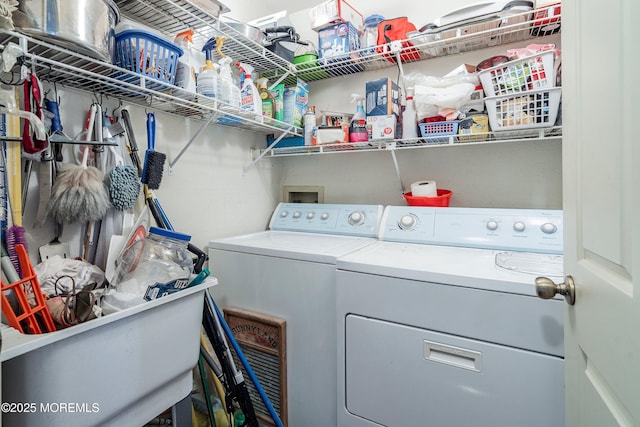 laundry room with washing machine and clothes dryer