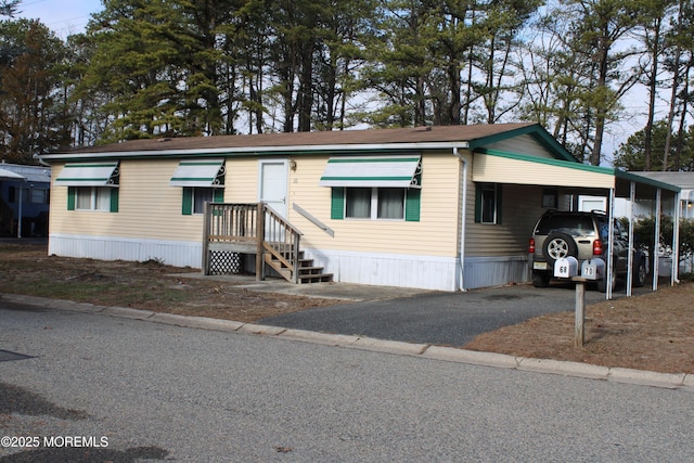 manufactured / mobile home with a carport