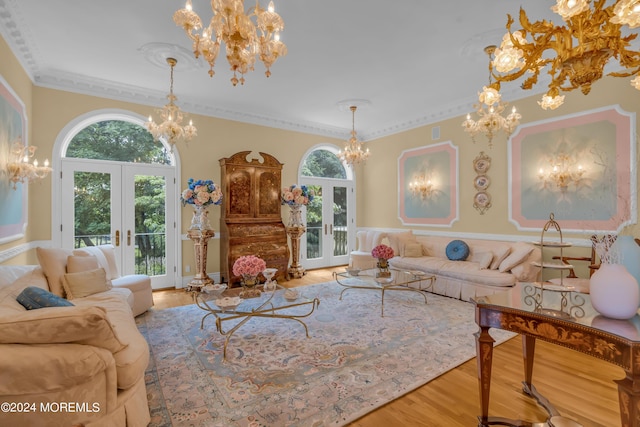 living room featuring crown molding, french doors, and wood-type flooring