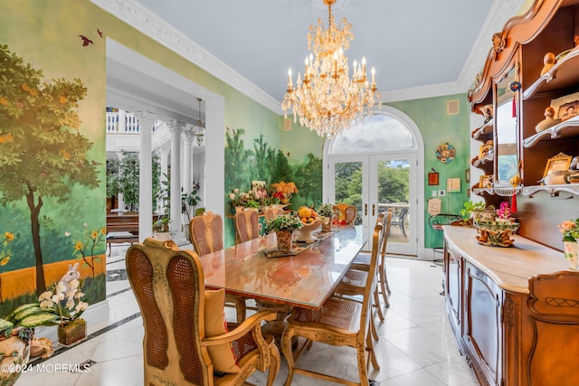 dining room with an inviting chandelier, french doors, ornamental molding, light tile patterned floors, and decorative columns