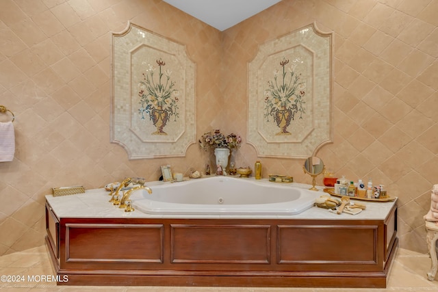 bathroom with a washtub and tile walls