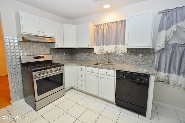 kitchen with gas range, sink, light tile patterned floors, black dishwasher, and white cabinetry