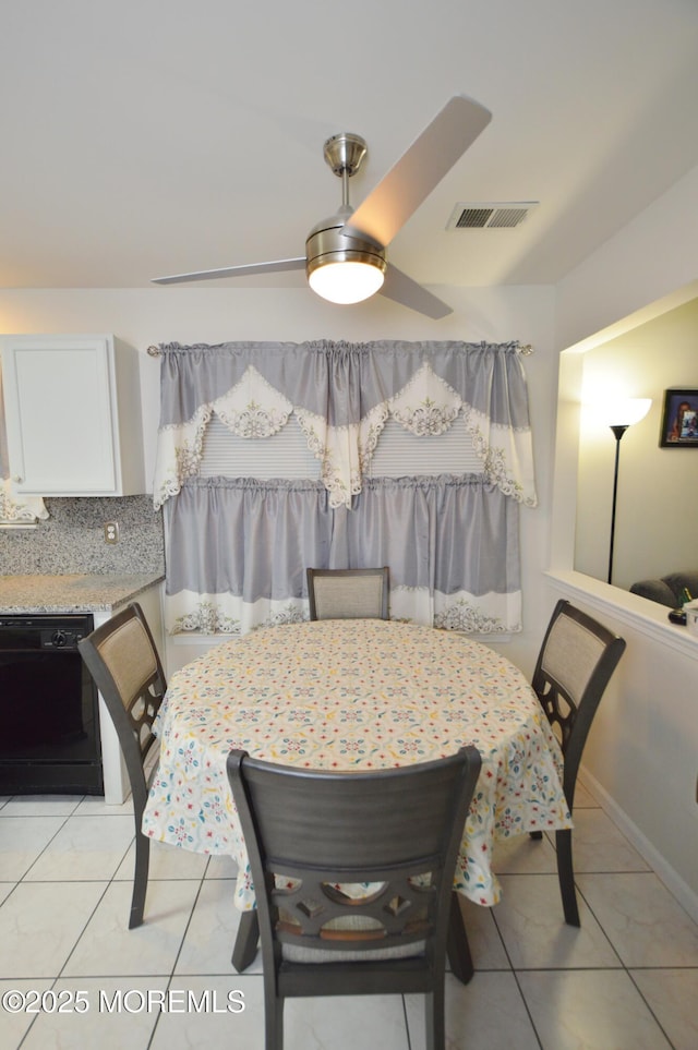 view of tiled dining space