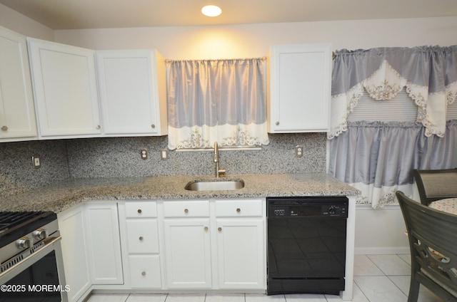 kitchen with dishwasher, sink, light stone countertops, tasteful backsplash, and white cabinetry