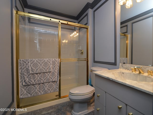 bathroom with tile patterned floors, walk in shower, vanity, crown molding, and toilet