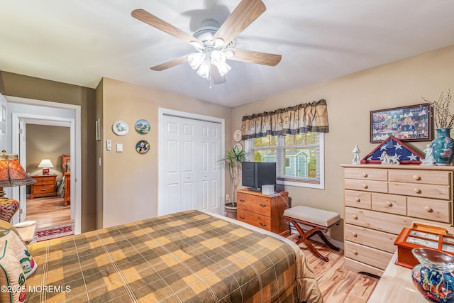 bedroom with a closet and ceiling fan