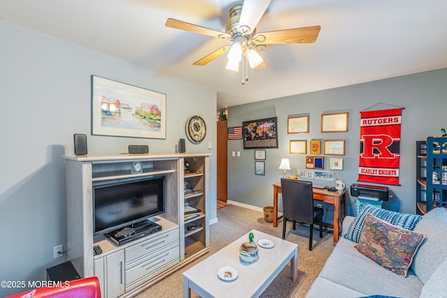 carpeted living room featuring ceiling fan