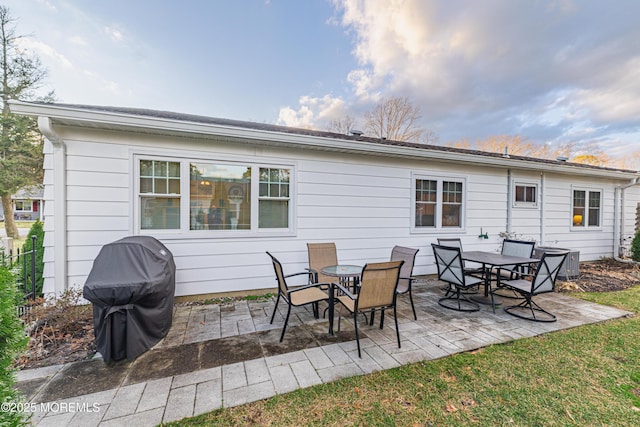 back of property featuring a patio