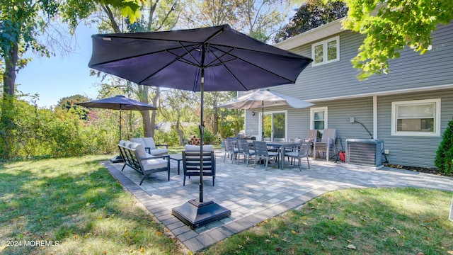 view of patio / terrace with outdoor lounge area and central AC unit